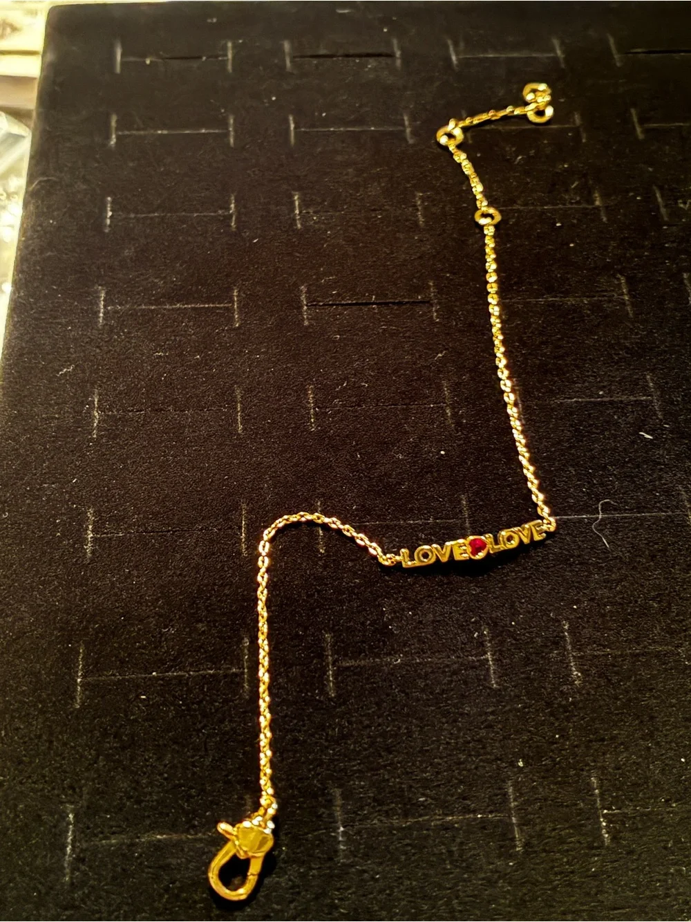 Kate Spade Gold 'LOVE' Chain Bracelet with Ruby Accent - Picture 3 of 3